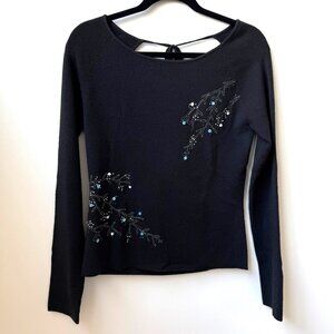 The Limited Black Long Sleeve Sweater w/ Open Back and Embroidery Design